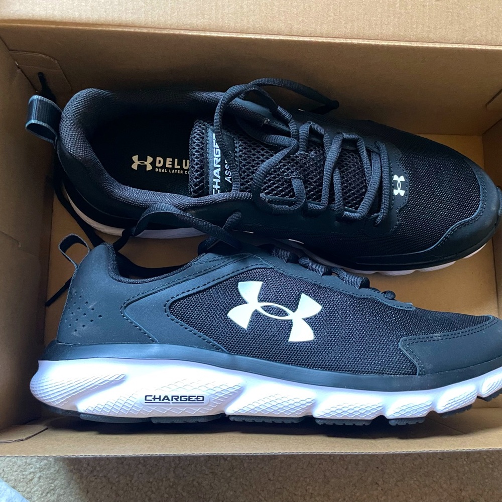 Under Armour Charged Assert 9 sneakers.